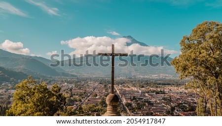 Panoramic aerial sunrise view of the city of Antigua, Guatemala with Agua Volcano