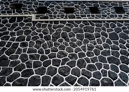black and white pattern texture on the wall