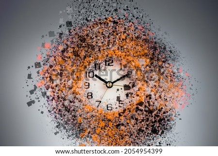 Dissolving orange alarm clock. Dissolving time