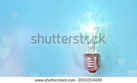 light bulb shining on a blue background