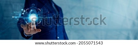 Businessman using fingerprint scanning unlock and access to business data network. Biometric identification and cyber security protect business transaction from online digital cyber attack. Royalty-Free Stock Photo #2055071543