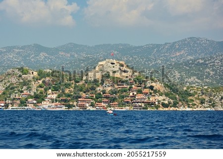 Simena castle and village froma kayak. Turquoise coast, Demre, Antalya, Turkey Royalty-Free Stock Photo #2055217559