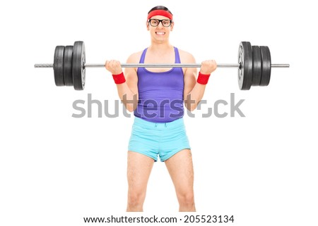 Nerdy guy lifting a heavy weight isolated on white background