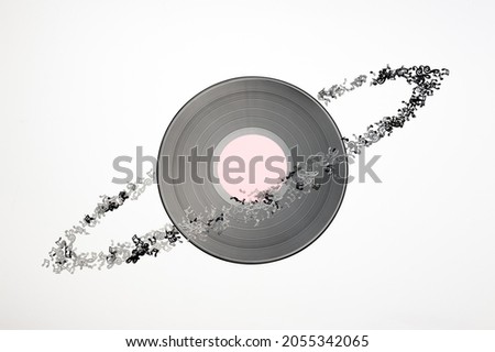 vintage music disc and notes looks like the planet on the white background