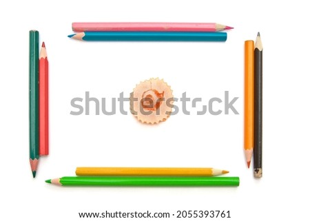 Colorful wood pencils shavings on white background. Isolared object.