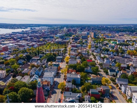 Munjoy Hill historic district aerial view with Portland downtown skyline at the background in Portland, Maine ME, USA. 