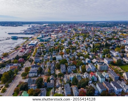 Munjoy Hill historic district aerial view with Portland downtown skyline at the background in Portland, Maine ME, USA. 