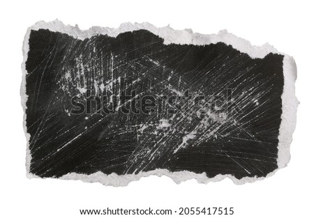 Black blank photo and empty scratched cardboard scrap, piece isolated on white background, clipping path