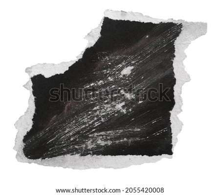 Black blank photo, scratched and empty scratched cardboard scrap, piece isolated on white background, clipping path