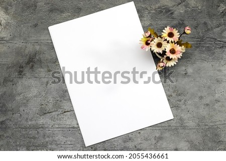 blank papers, billboard  for your design or your text with flowers pot