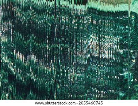 Glitch background. Color distortion. Static interference. Abstract sequin texture. Dark green white digital noise drip lines defect overlay.