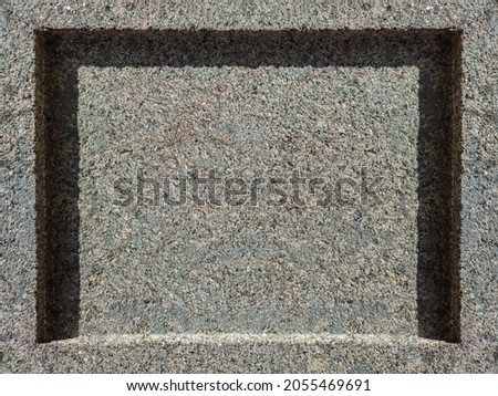 Square granite slab with advertising space close up.