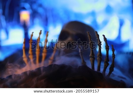 Skeleton Zombie Hand Rising Out Of GraveYard - Halloween
