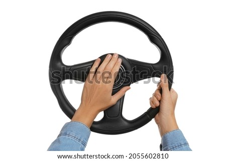 Woman with steering wheel on white background, closeup Royalty-Free Stock Photo #2055602810