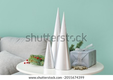 Beautiful Christmas decorations on table in room