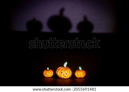 Funny halloween pumpkins on black background