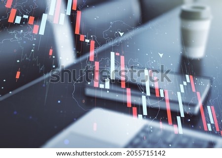 Double exposure of creative abstract global crisis chart with world map hologram on laptop background. Financial crisis and recession concept