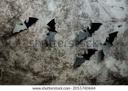 Background of flying bats made of paper