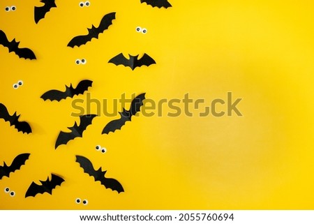 yellow background with bat pattern