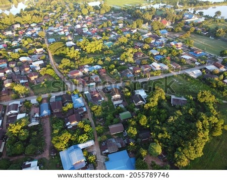 aerial photograph of rural communities in the morning sunrise