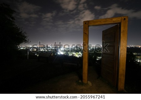 doors on the background of the night city