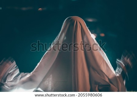 Scary ghost in dark, spooky halloween night