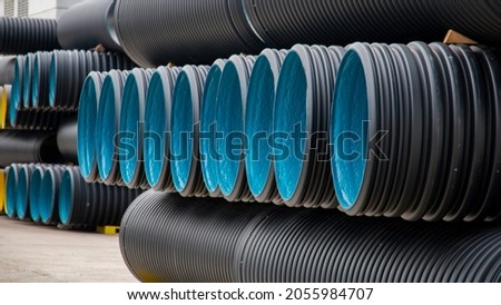 corrugated pipes waiting to be shipped at the production site Royalty-Free Stock Photo #2055984707