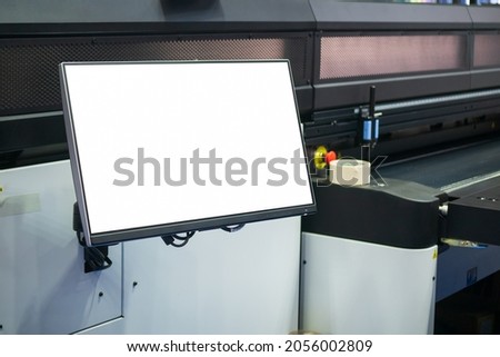 The computer screen operates the inkjet machine.