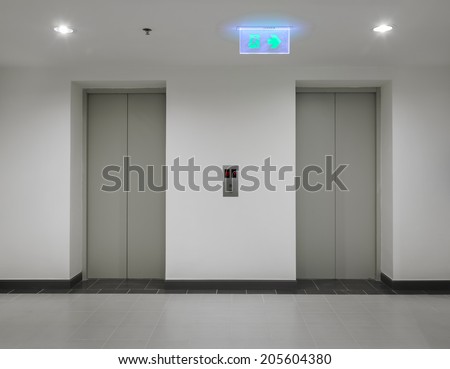 Two elevators with closed door