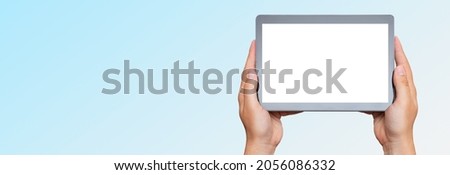 Hand holding digital tablet, placeholder for app, blank screen mockup