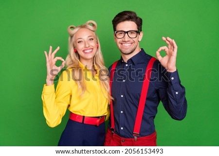 Photo of young lovely couple show okay alright sybol perfect ideal recommend isolated over green color background