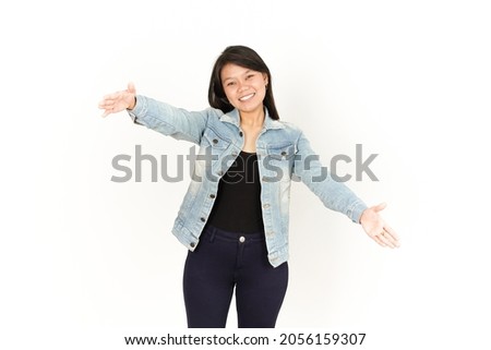 Give a Hug of Beautiful Asian Woman Wearing Jeans Jacket and black shirt Isolated On White Background