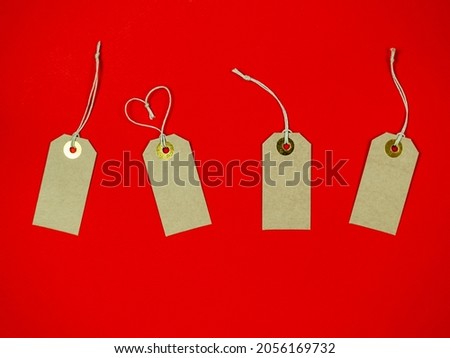 The tags are on a red background. Sale, shopping, discount.