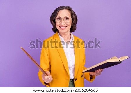 Photo of clever librarian grey old lady read book point wear eyewear yellow jacket isolated on purple color background