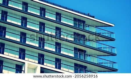Modern apartment building. Modern urban architecture and details of building facade.Sunlight.