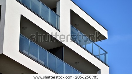 Modern apartment building. Modern urban architecture and details of building facade.Sunlight.