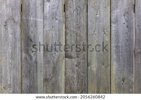 old dry weathered gray wooden planks board surface - full frame background and texture.
