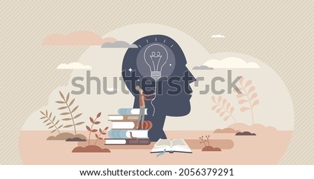 Educational psychology tiny person concept with light bulb and head. Teaching techniques for minds intellectual development. Empowering human curiosity, imagination and discovery process by learning. Royalty-Free Stock Photo #2056379291