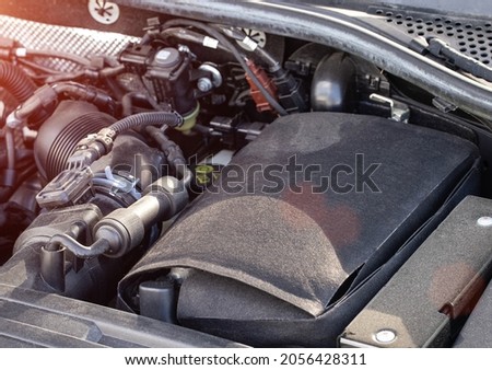 thermal protective cover for the car battery for keeping warm in cold weather Royalty-Free Stock Photo #2056428311