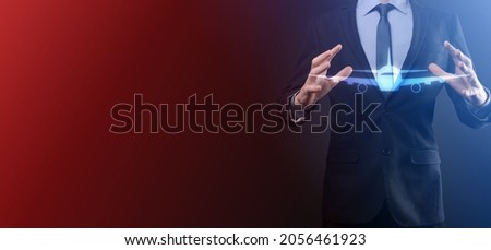 Businessman man holding an plane airplane icon in his hands. Online ticket purchase.Travel icons about travel planning, transportation, hotel, flight and passport.Flight ticket booking concept.