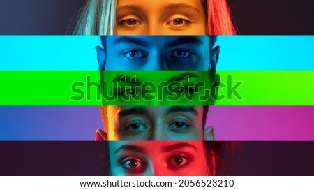 Collage of close-up male and female eyes isolated on colored neon backgorund. Multicolored stripes. Concept of equality, unification of all nations, ages and interests. Diversity and human rights Royalty-Free Stock Photo #2056523210