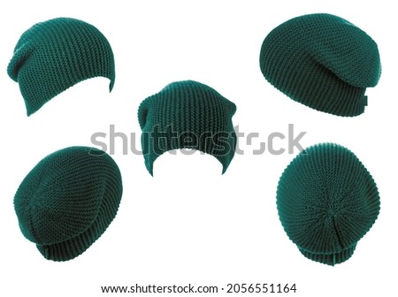 Set of five knitted dark green hat isolated on white background .green.
