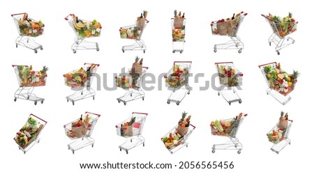 Set with shopping carts full of groceries on white background. Banner design Royalty-Free Stock Photo #2056565456