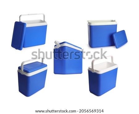 Set with blue plastic cool boxes on white background 