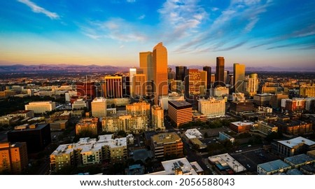 drone view above gorgeous golden hour sunrise in Downtown Denver , Colorado the Mile High City gorgeous Rocky Mountain capital city view