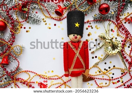 christmas card for children. ballerina and nutcracker figurine