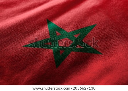 Close up waving flag of Morocco. Concept of Morocco. Royalty-Free Stock Photo #2056627130