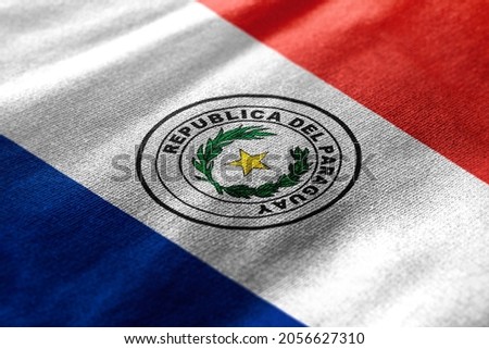 Close up waving flag of Paraguay. Concept of Paraguay.