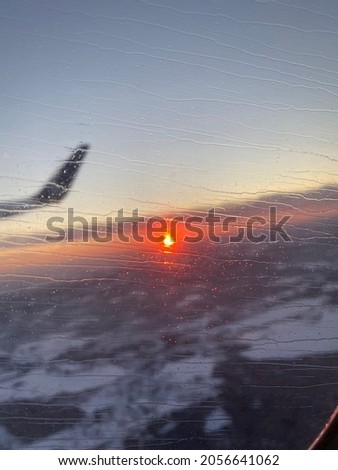 Travel, picture of the sun from an airplane