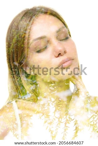 Creative portrait of a beautiful woman combined with a picture of fresh green leaves on a white background